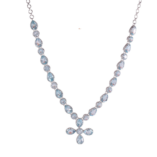 Dazzling Blue Topaz Cross Drop Necklace in Sterling Silver