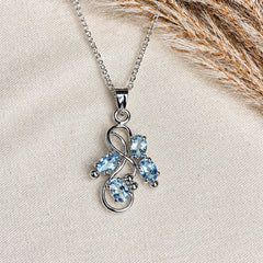925 Silver Handmade Blue Topaz Oval Gemstone Pendant Floral Leaf Design