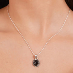 925 Sterling Silver Black Onyx Gemstone Pendant Oval Cabochon and Detailed Sunburst Design