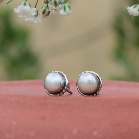 925 silver Eartops with round cultured Pearl in oxidised finish with push closure.