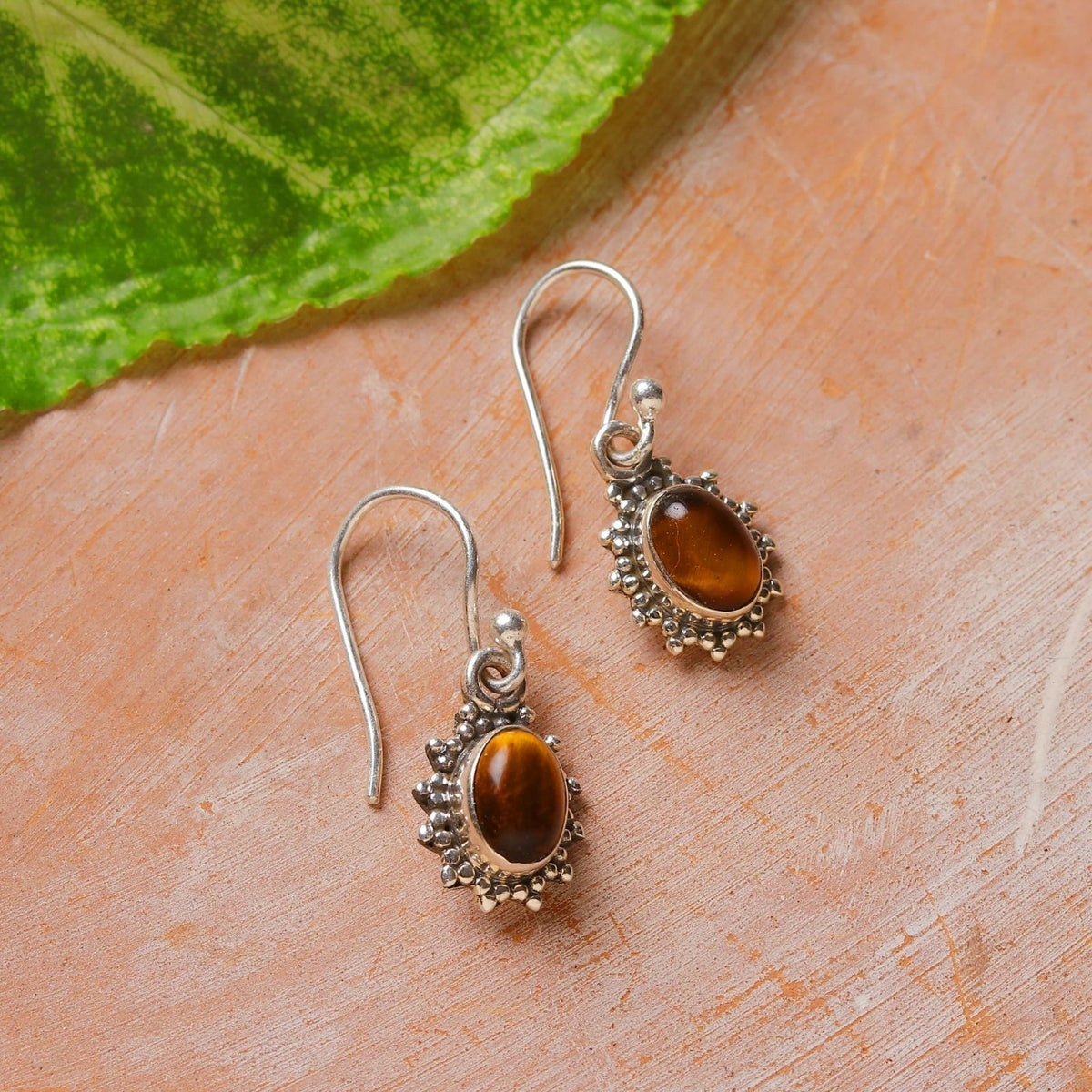 925 Silver Earrings with Oval Cabuchon Tiger Eye Gemstone in Bezel setting with ball earwire and ball design on bezel