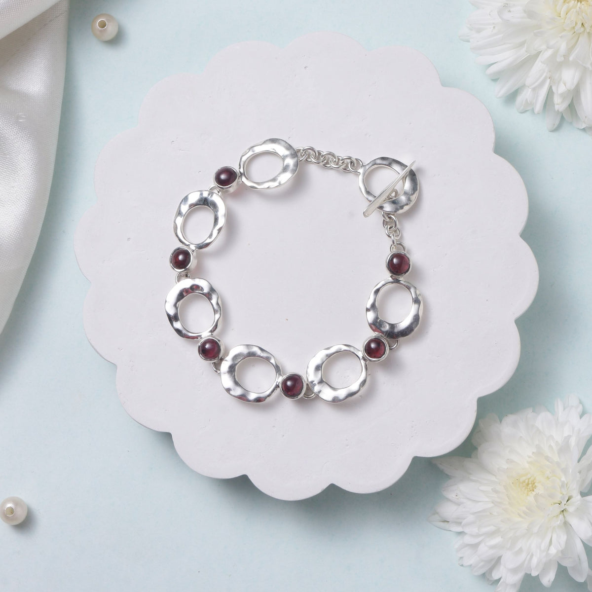 Aavart – Garnet Circular Link Bracelet