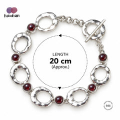 Aavart – Garnet Circular Link Bracelet