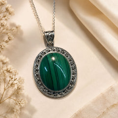 925 Sterling Silver Malachite Oval Pendant Cabochon Cut Ornate Scroll Frame Design