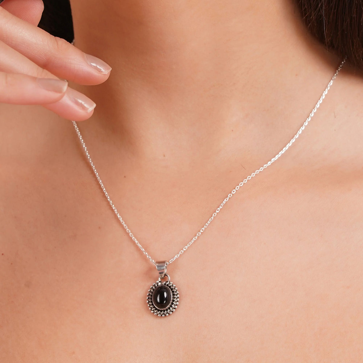 925 Sterling Silver Black Onyx Gemstone Pendant Oval Cabochon and Detailed Sunburst Design