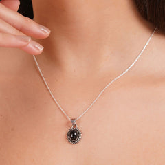 925 Sterling Silver Black Onyx Gemstone Pendant Oval Cabochon and Detailed Sunburst Design