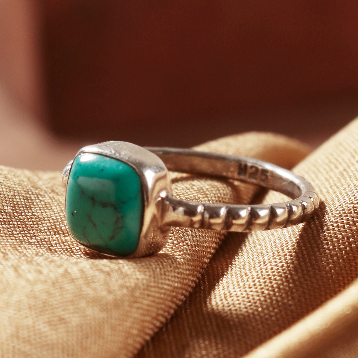 925 silver Ring with square turquoise with rounded edges set in bezel setting with handmade notched band.