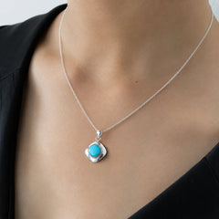 Silver necklace with a turquoise pendant